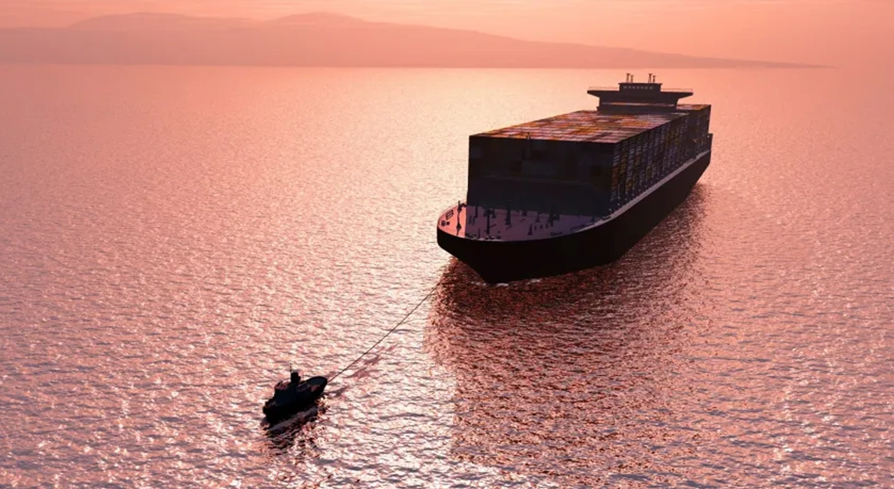 Small boat pulling a larger tanker in the sea