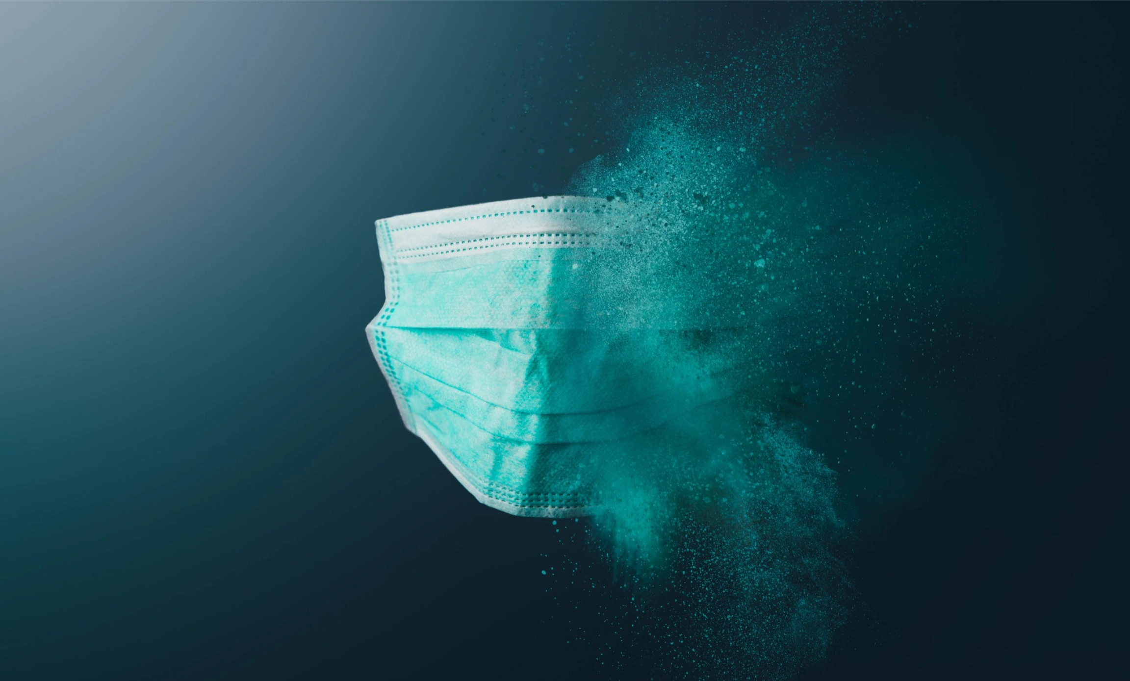 Medical face mask fading away in artistic powder effect