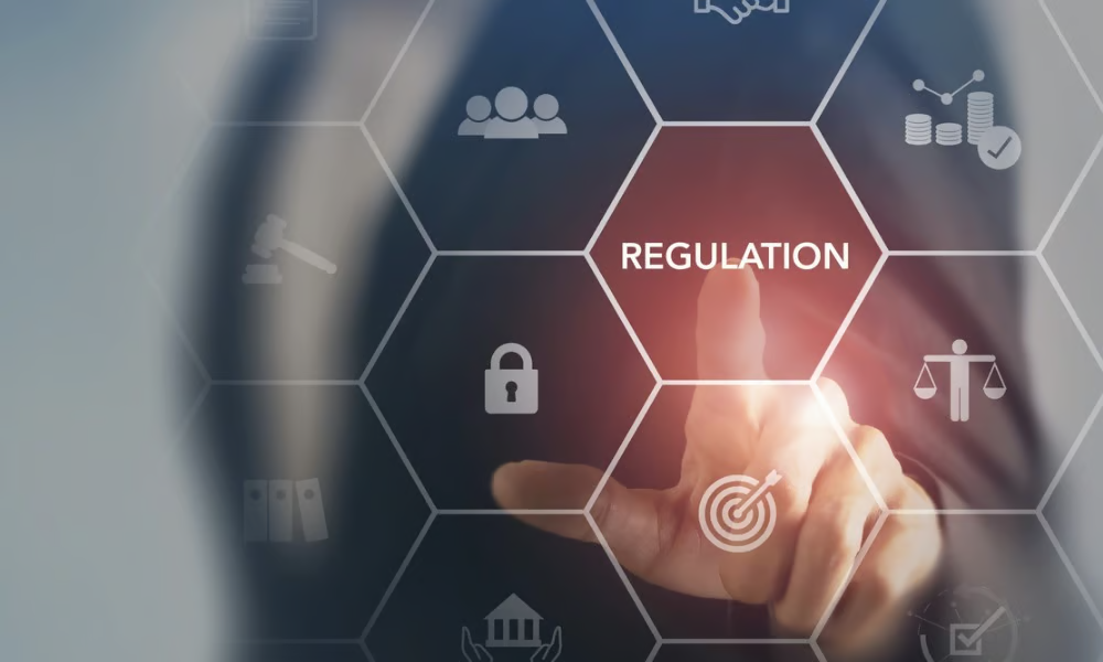 Businessman’s hand pointing at a financial graph, symbolizing corporate regulations and compliance